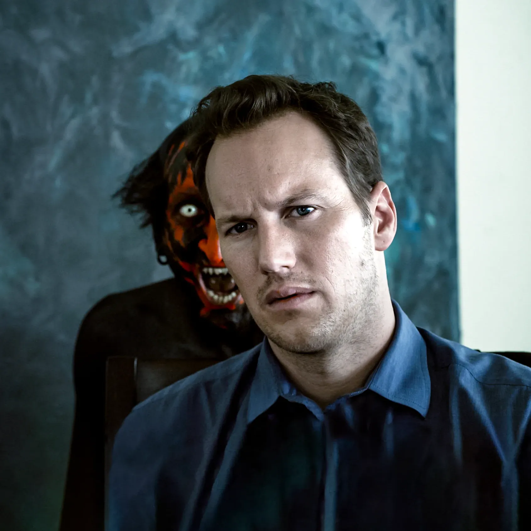 The husband from Insidious with a demon behind him