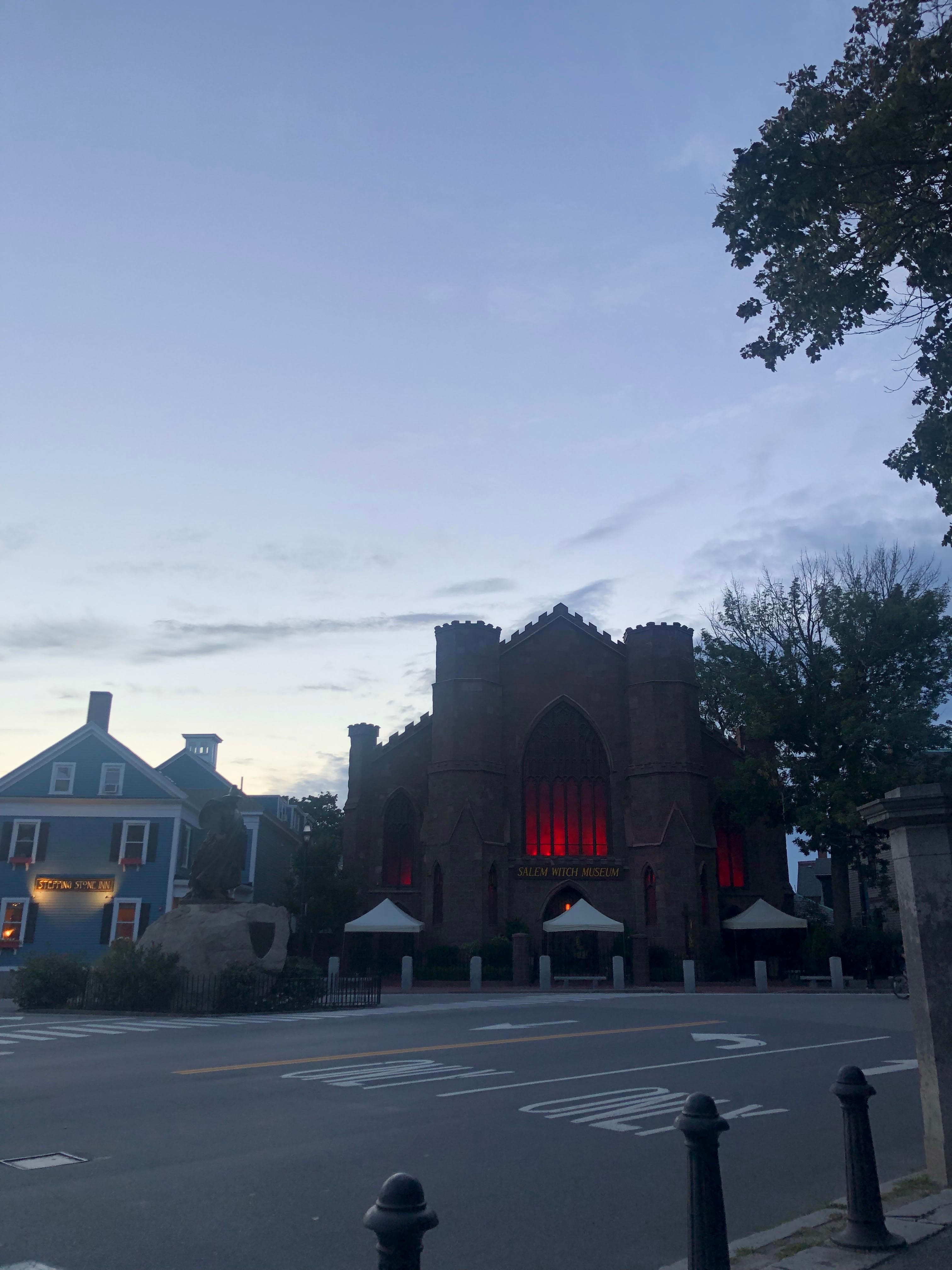 A big glowing red window in a cathedral