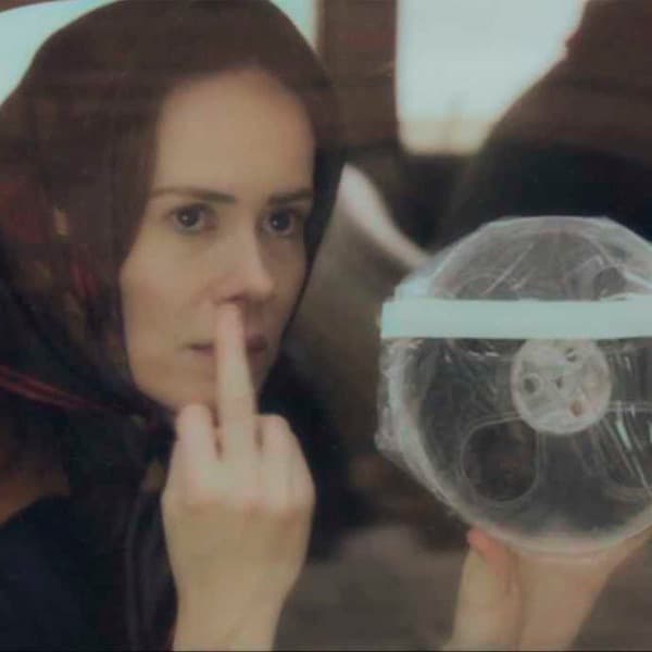 Sarah Paulson raising her middle finger
